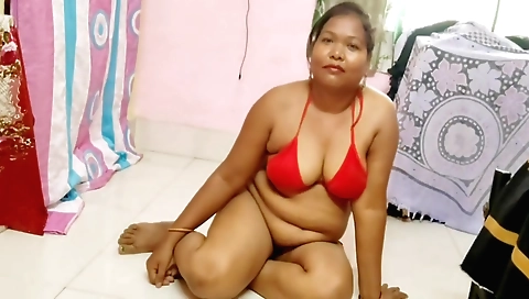 Indian brunette enjoys selfsexing on bed in solo scene