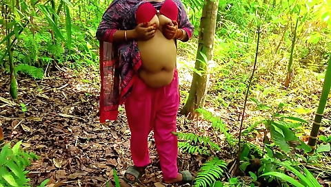 Brunette with a sexy round booty is riding a big dick outdoors