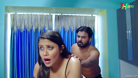 Brunette is on the sofa with her phone and is having fun