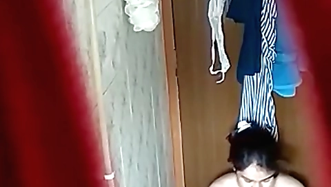 Sexy Indian woman is taking a luxurious shower and masturbating