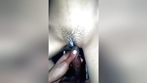 Indian bhabhi with a hairy pussy gives a blowjob to a man