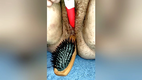 Hairy girl plays with her hairy pussy in amateur solo