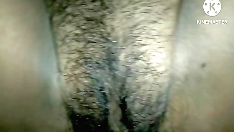 Indian porn video shows a hairy pussy with a long rod