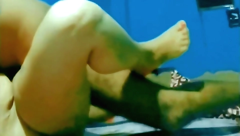 Amateur chick in a white blouse and black stockings