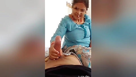 Amateur brunette handjob with her stepbrother in the car