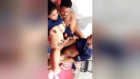 Indian teen and a big guy are having a threesome in the yard