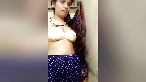 Stunning brunette shows off her body on web cam video