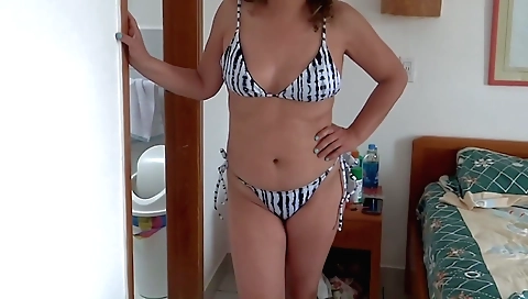 Indian solo bikini girl with nice curves on a beach