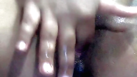 Asian girl masturbating while her boyfriend watches