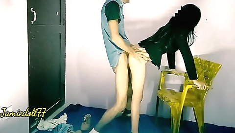 Teen delivery boy in red and black is delivering a gift to her