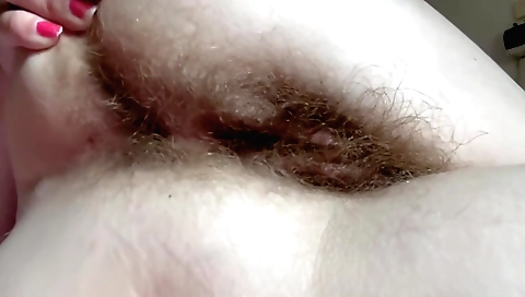 Japanese girl with a hairy pussy shows her hairy pussy