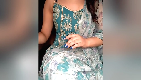 Beautiful brunette with a beautiful body talks on webcam