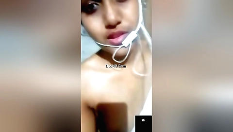 Sexy black dress brunette in a sexy dress showing her small boobies