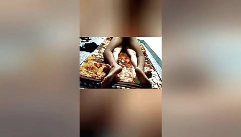 Indian woman and her friend stuck in a car in a traffic jam