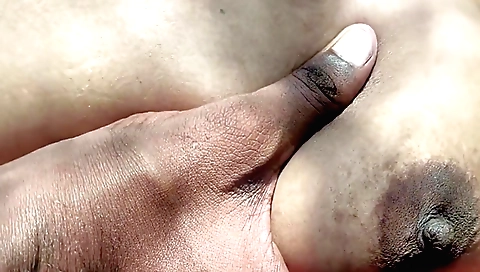 Indian teen in a white dress and black t-shirt in the forest