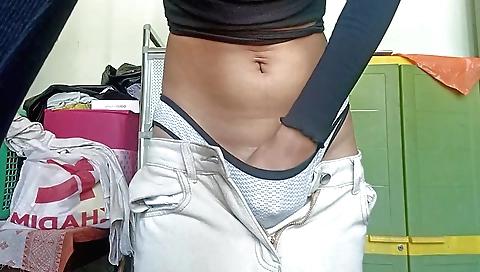 Indian girl in black bikini does not care about others