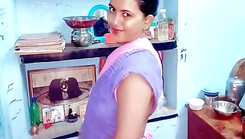 A brunette gives a handjob to a guy in his bed for a solo video