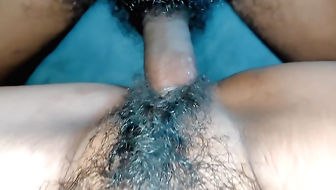 Busty babe with a hairy pussy takes a cock inside her mouth