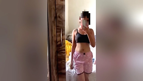 Bare college girl with nothing on her white tank top