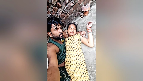 Indian teen in a short dress is playing with a toy