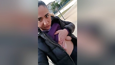 Outdoor amateur solo video with a brunette with big tits