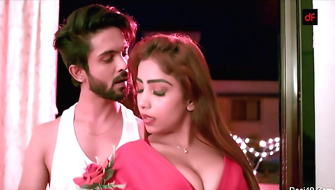 Red head bangal girl in red dress in bed making out