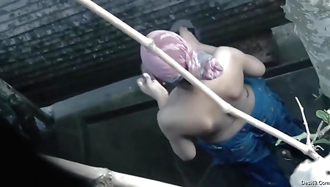 Indian naked with a bikini and pantyhose in the pool