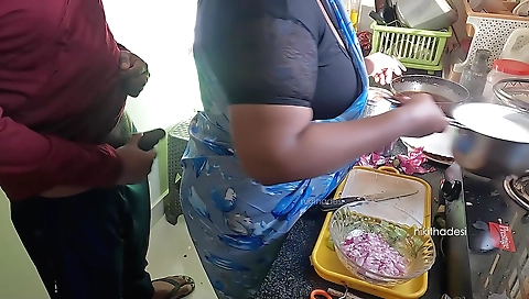 Indian babe jerks cock in the kitchen with no clothes on