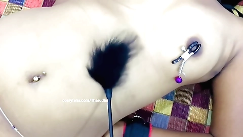 Hot bondage scene with a kinky girl on custom bondage