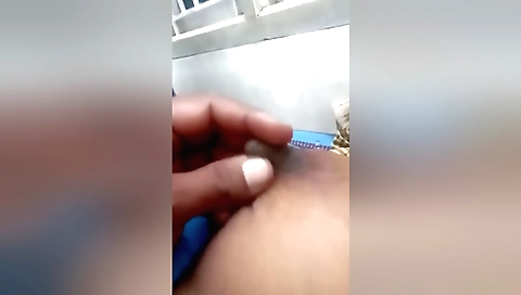 Hottie in a white blouse takes deep breath in a hot solo video