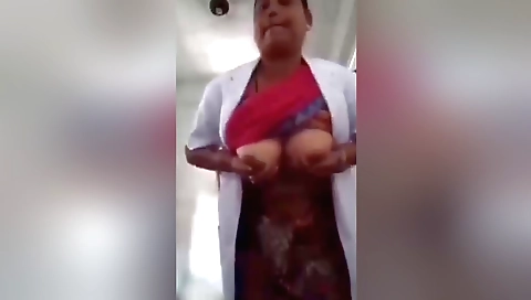 I show off my big boobs and my hairy pussy to the camera