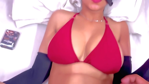 Hot Indian amateur girl on her bed showing her lingerie